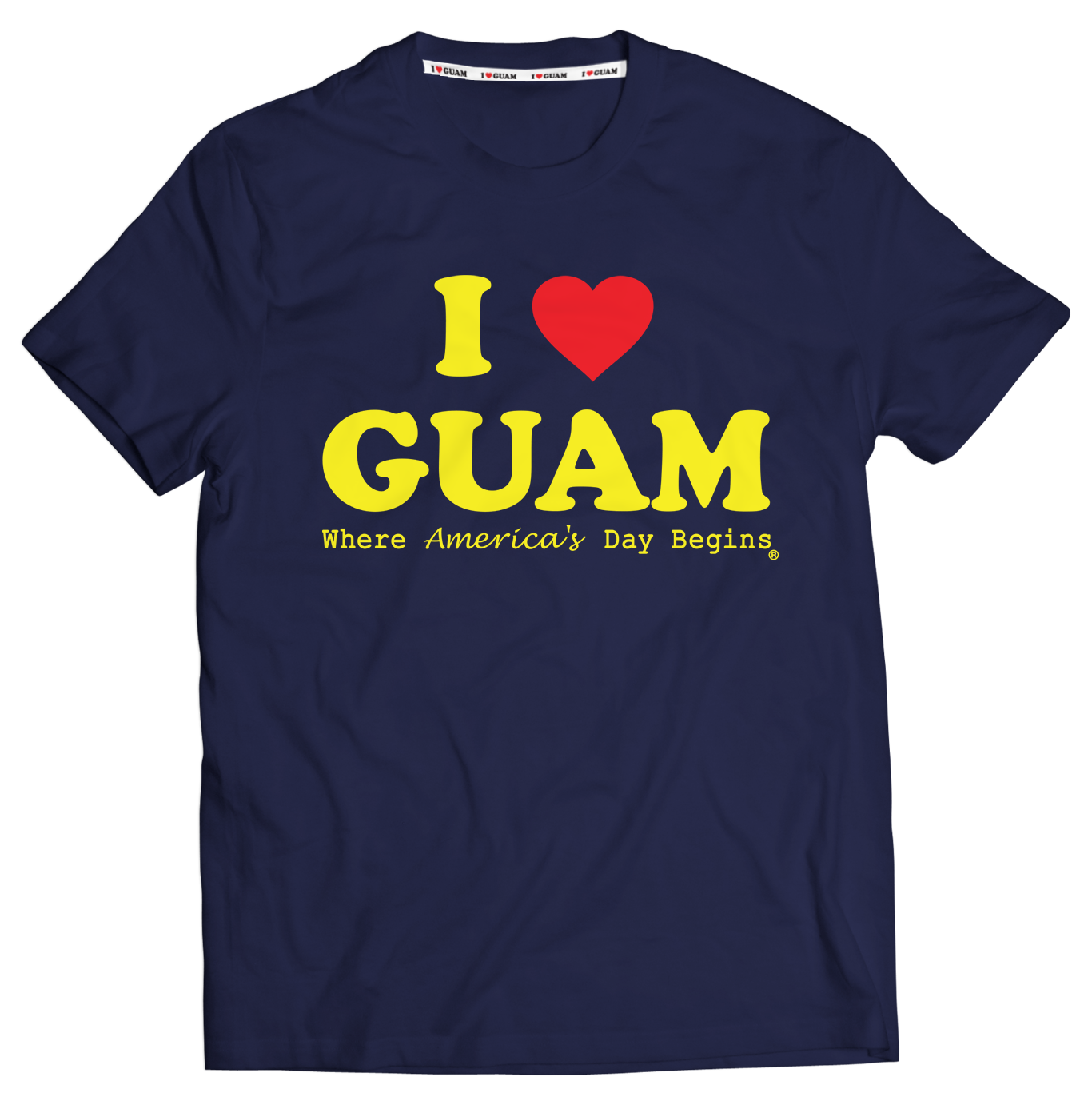Navy blue unisex t-shirt with ‘I ❤️ GUAM’ in bold yellow letters and a red heart, accompanied by the slogan ‘Where America’s Day Begins’ in yellow text. The design celebrates Guam’s identity and unique time zone.