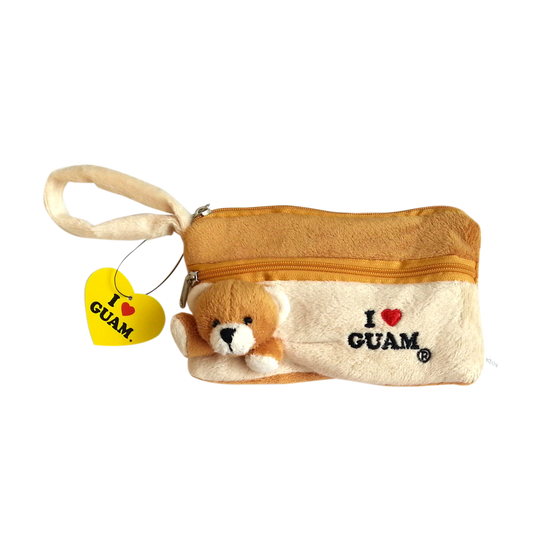 Soft brown plush bear pouch with ‘I ❤️ GUAM’ logo, perfect for storing small accessories or as a Guam souvenir gift. Includes a yellow heart-shaped ‘I ❤️ GUAM’ tag.